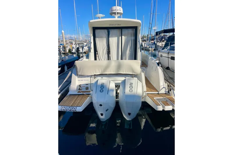 Slide: The Image of 2020 Beneteau Antares 9 boat docked at Dana Point, California marina. - 2