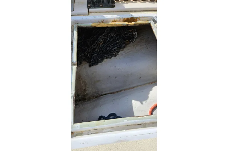 Slide: The Image of Deck of 1973 Prout 35 sailboat with anchor windlass and chain. - 28