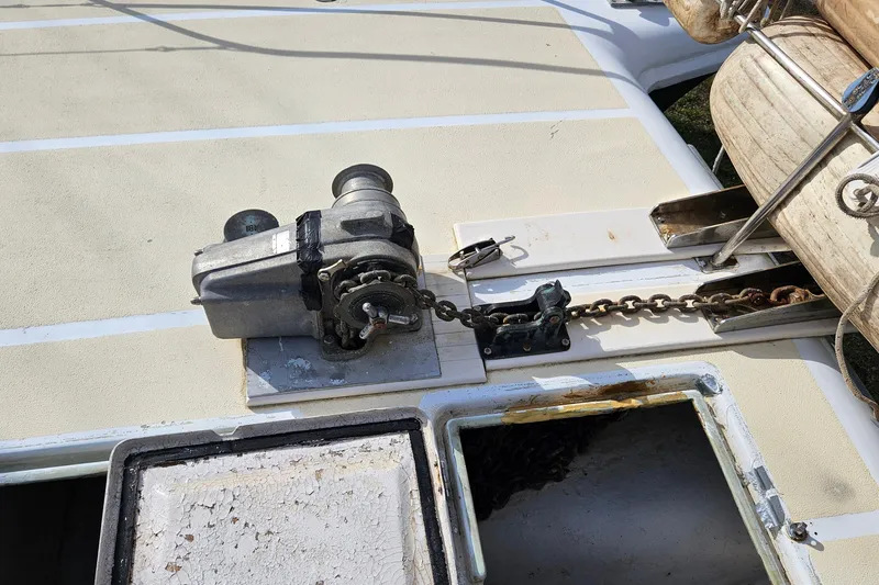 Slide: The Image of Mast of 1973 Prout 35 sailboat against a blue sky with clouds. - 29