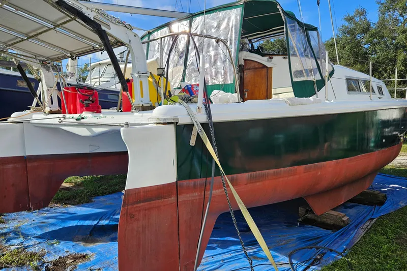 Slide: The Image of 1973 Prout 35 boat deck with windows and hatch, showcasing classic design. - 3
