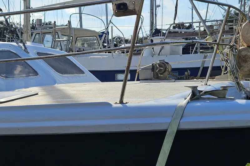 Slide: The Image of 1973 Prout 35 yacht helm with steering wheel and navigation equipment. - 7