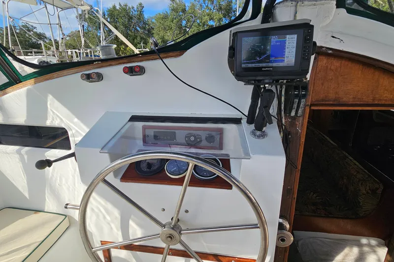 Slide: The Image of Garmin navigation system on 1973 Prout 35 sailboat, displaying nautical data. - 8