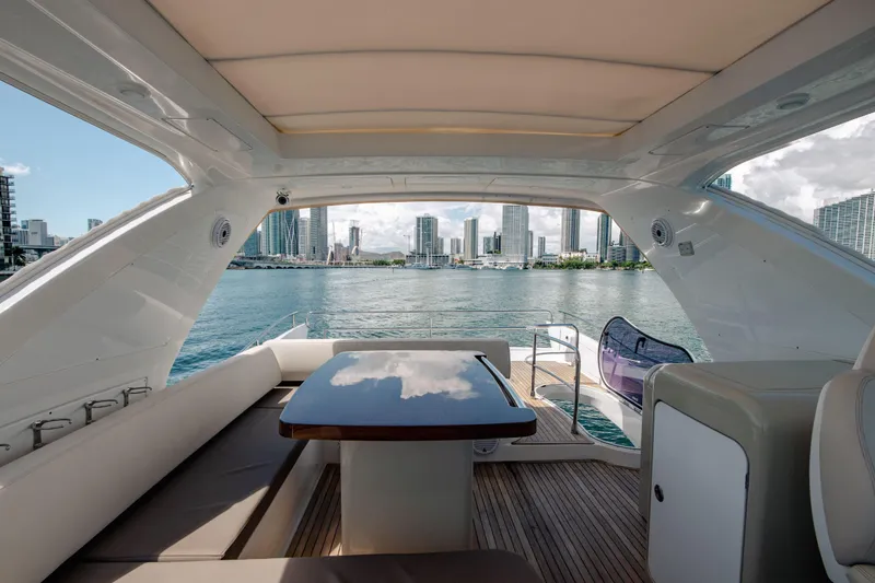 Slide: The Image of Luxurious 2016 Azimut 64 Flybridge yacht interior with city skyline view. - 10