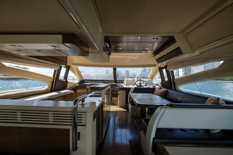 Slide: The Image of Luxurious interior of 2016 Azimut 64 Flybridge yacht with modern design and city skyline view. - 19