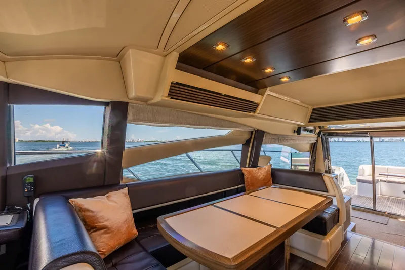 Slide: The Image of Luxurious interior of 2016 Azimut 64 Flybridge yacht with ocean view. - 21