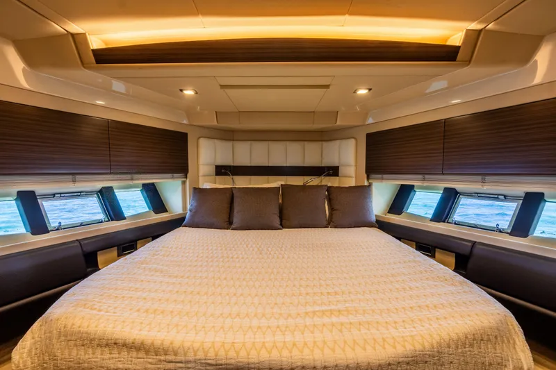 Slide: The Image of Luxurious bedroom interior of 2016 Azimut 64 Flybridge yacht with elegant design and ocean view. - 26