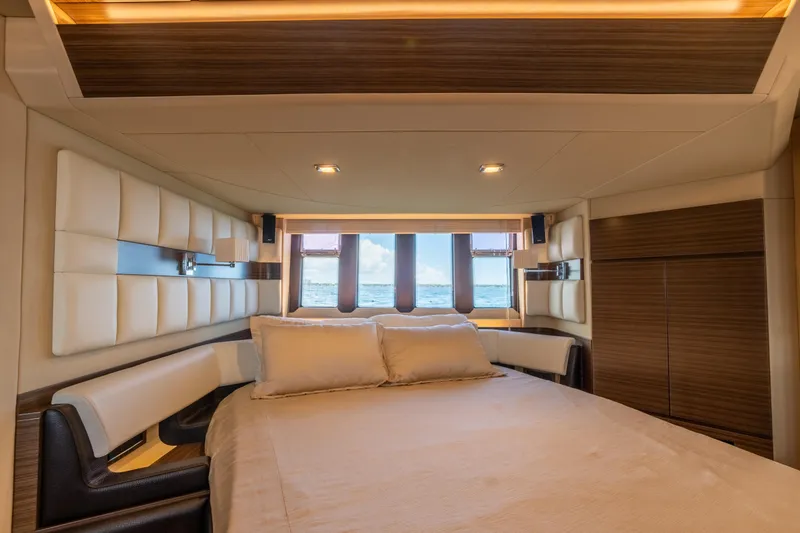 Slide: The Image of Luxurious bedroom interior of 2016 Azimut 64 Flybridge yacht with ocean view. - 28