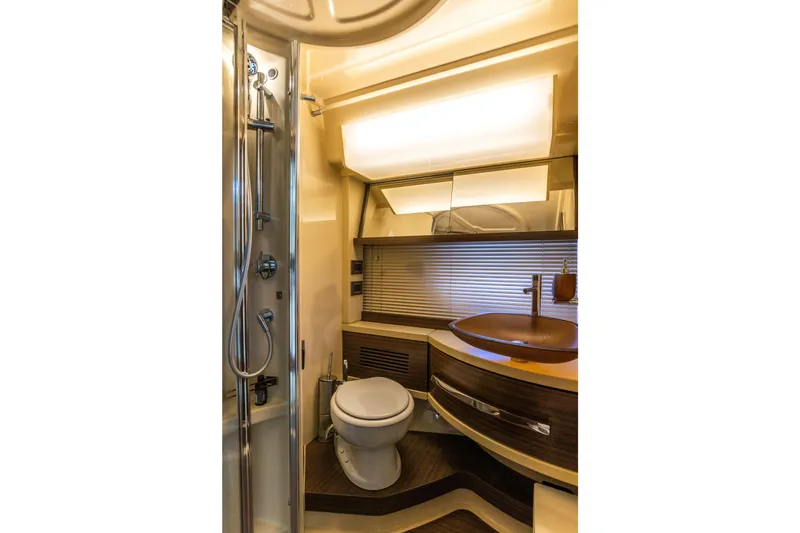 Slide: The Image of Luxurious bathroom in 2016 Azimut 64 Flybridge yacht with modern fixtures and elegant design. - 29