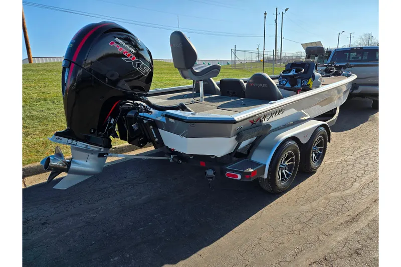 Slide: The Image of 2023 Vexus AVX1980 boat with Mercury Pro XS engine on a trailer. - 3