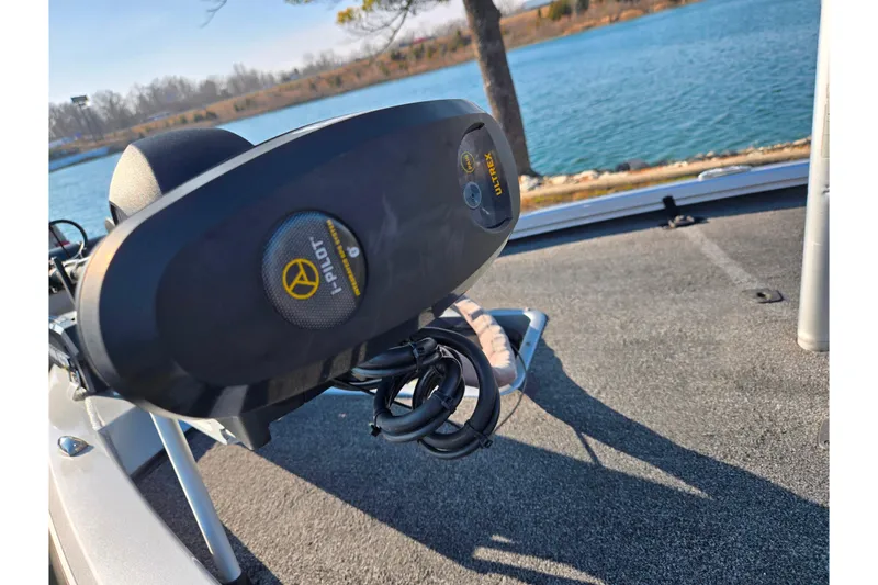 Slide: The Image of 2023 Vexus AVX1980 boat with i-Pilot Ultrex trolling motor by a lake. - 8