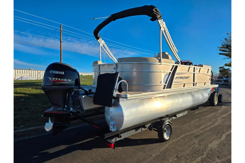 Slide: The Image of 2021 Starcraft EX 20 R pontoon boat with Yamaha VMAX engine on trailer. - 3