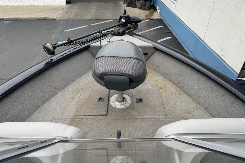 Slide: The Image of 2010 Tracker Targa 17 boat interior with trolling motor and seating. - 16