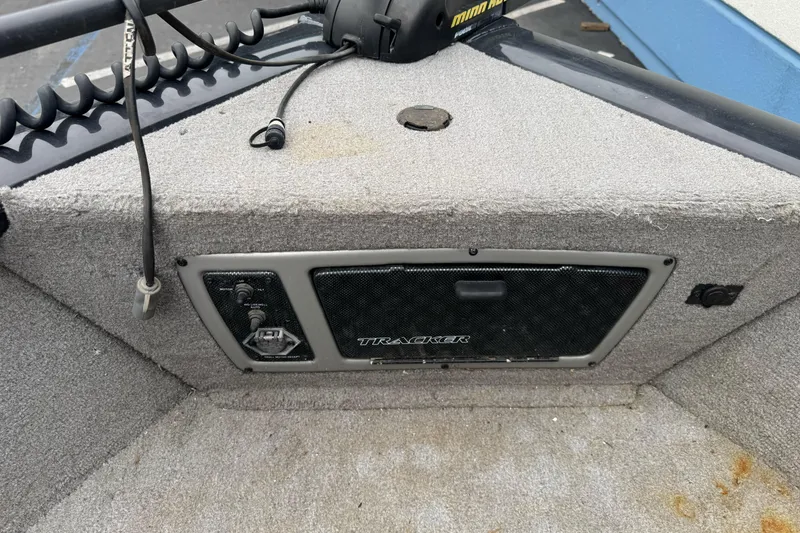 Slide: The Image of 2010 Tracker Targa 17 boat interior with control panel and wiring. - 17