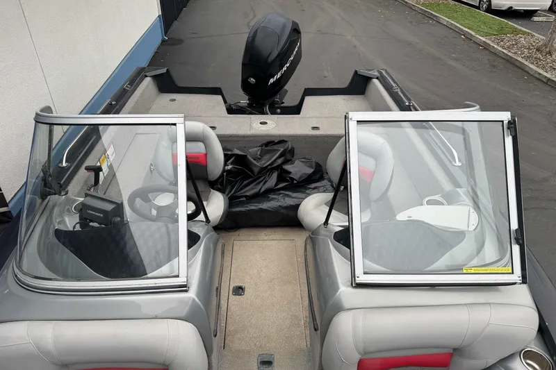 Slide: The Image of 2010 Tracker Targa 17 boat interior with dual seats and windshield. - 18