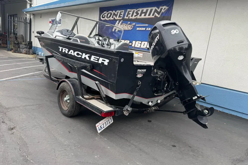 Slide: The Image of 2010 Tracker Targa 17 boat with Mercury 90 engine on trailer. - 7