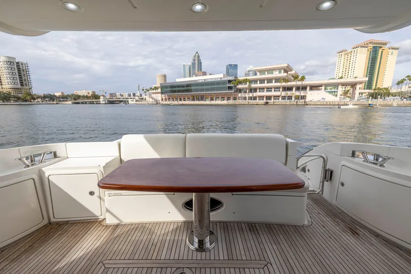 Slide: The Image of View from the deck of a 2012 Azimut 48 Flybridge yacht overlooking a city waterfront. - 13