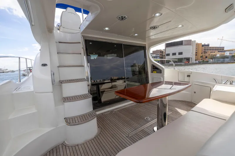 Slide: The Image of 2012 Azimut 48 Flybridge yacht with spacious deck and modern amenities. - 14