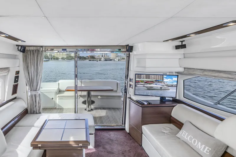Slide: The Image of Interior of 2012 Azimut 48 Flybridge yacht with waterfront view. - 19