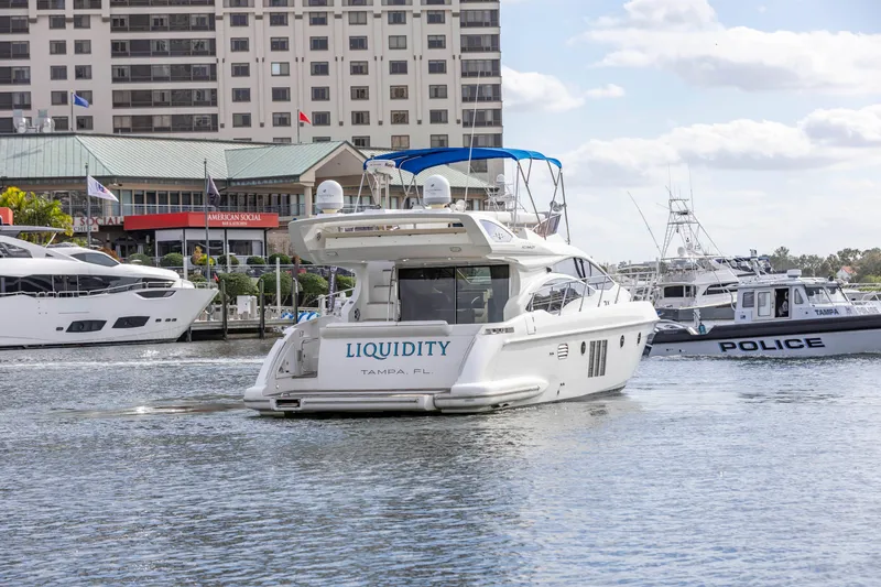 Slide: The Image of 2012 Azimut 48 Flybridge yacht Liquidity in a marina. - 3