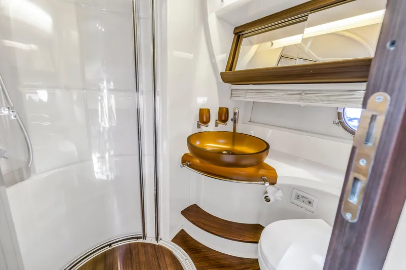 Slide: The Image of Luxurious bathroom in 2012 Azimut 48 Flybridge yacht with modern fixtures and elegant design. - 31