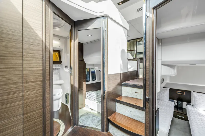 Slide: The Image of Interior of 2012 Azimut 48 Flybridge yacht with modern design and wooden finishes. - 35