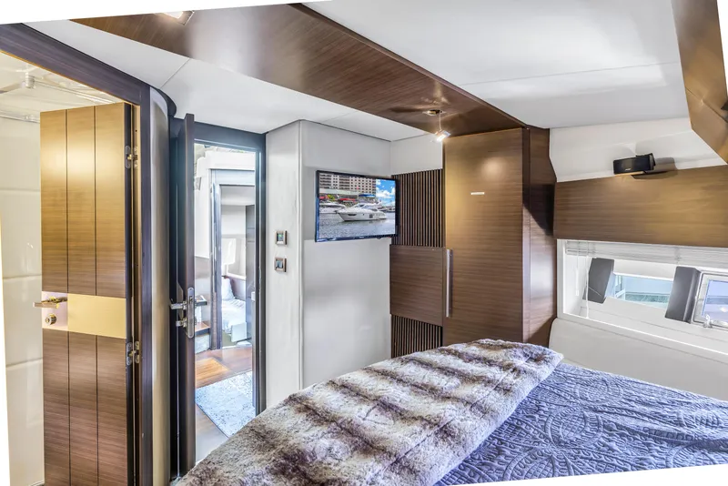 Slide: The Image of Luxurious bedroom interior of 2012 Azimut 48 Flybridge yacht with modern decor and TV. - 37