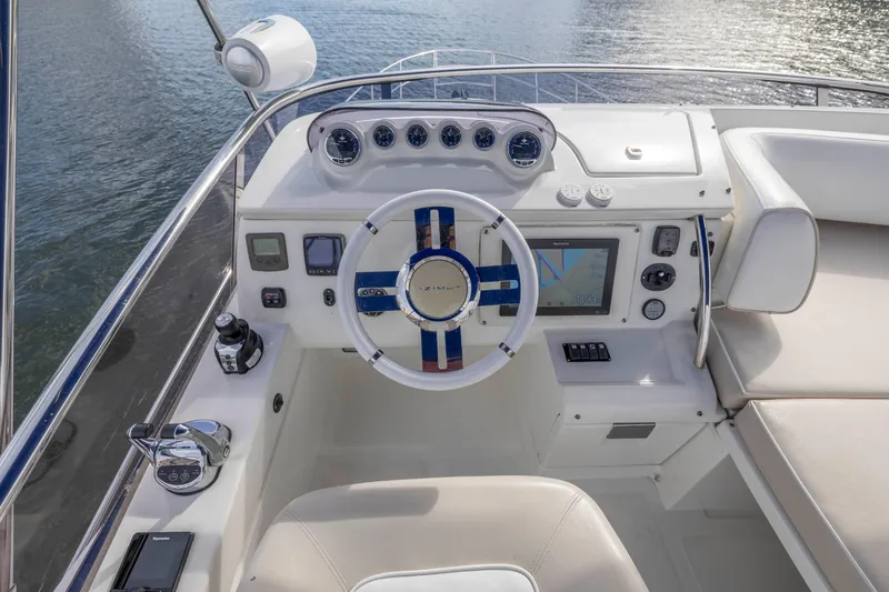 Slide: The Image of Helm station of 2012 Azimut 48 Flybridge yacht with navigation instruments. - 40
