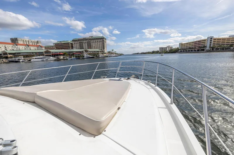 Slide: The Image of Bow view of 2012 Azimut 48 Flybridge yacht in a marina. - 7