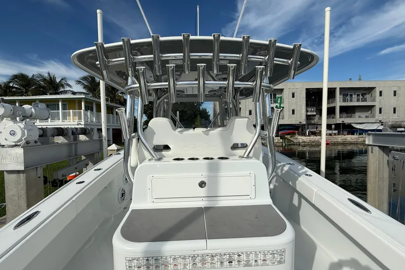 Slide: The Image of 2022 Freeman 34VH boat docked, featuring sleek design and modern amenities. - 24