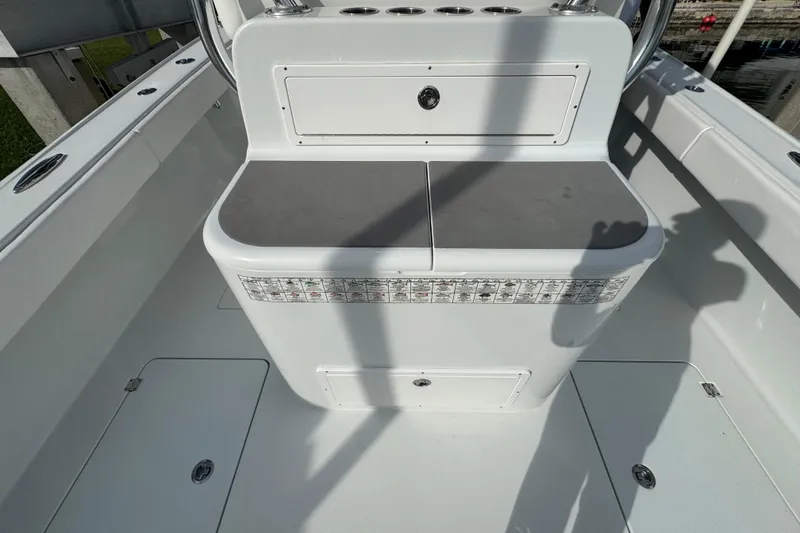 Slide: The Image of 2022 Freeman 34VH boat interior with storage compartments and seating area. - 8