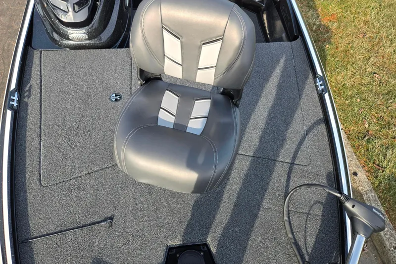 Slide: The Image of 2020 Nitro Z17 boat interior with gray seat and carpeted deck. - 18