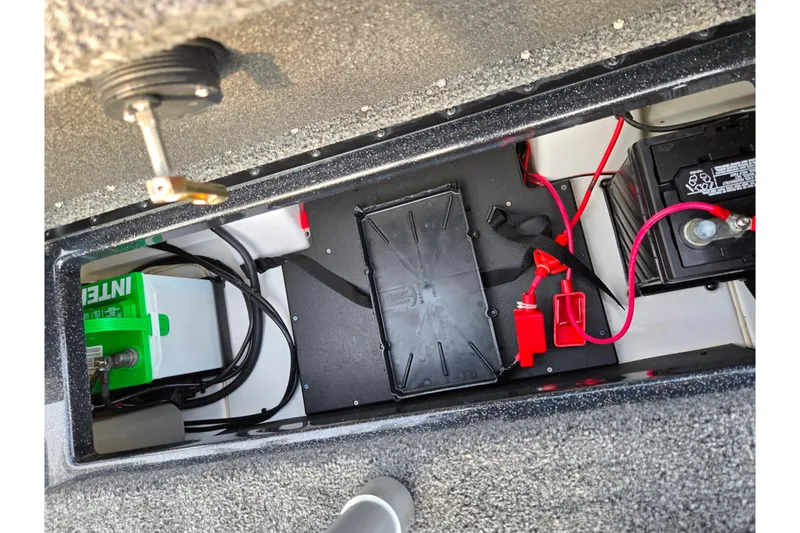 Slide: The Image of 2020 Nitro Z17 boat battery compartment with wiring and components. - 23