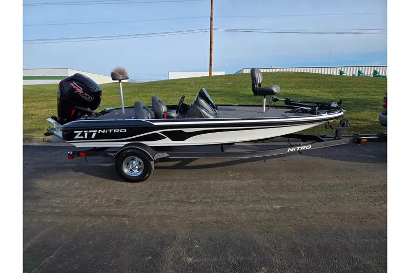Slide: The Image of 2020 Nitro Z17 boat on trailer, side view, parked outdoors. - 4