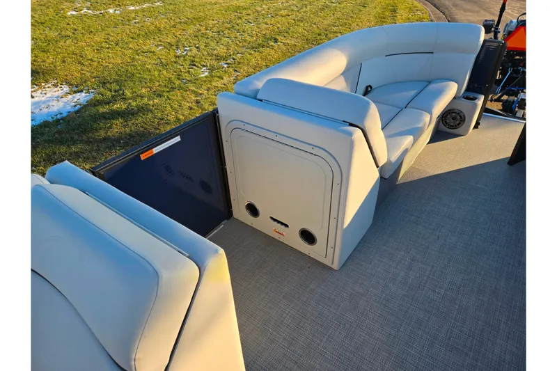 Slide: The Image of 2022 Crest Classic LX 220 boat interior with plush seating and modern design. - 22