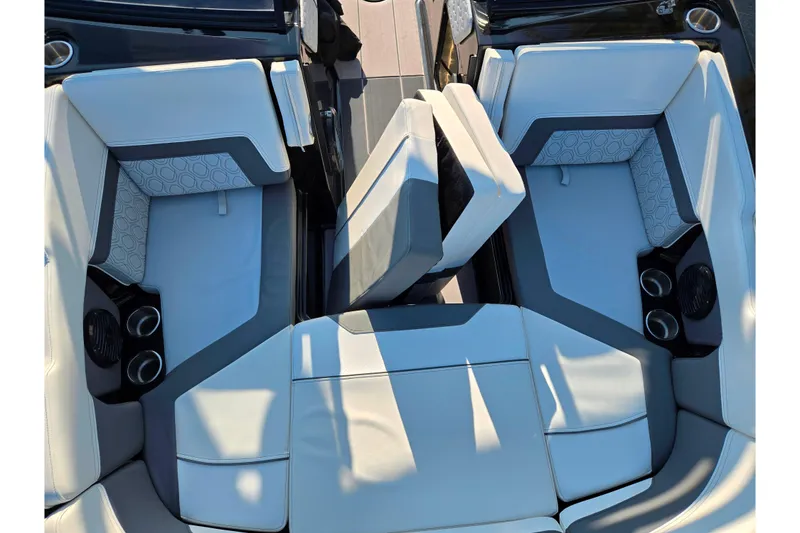 Slide: The Image of 2023 Heyday H22 boat interior with modern seating and cup holders. - 17