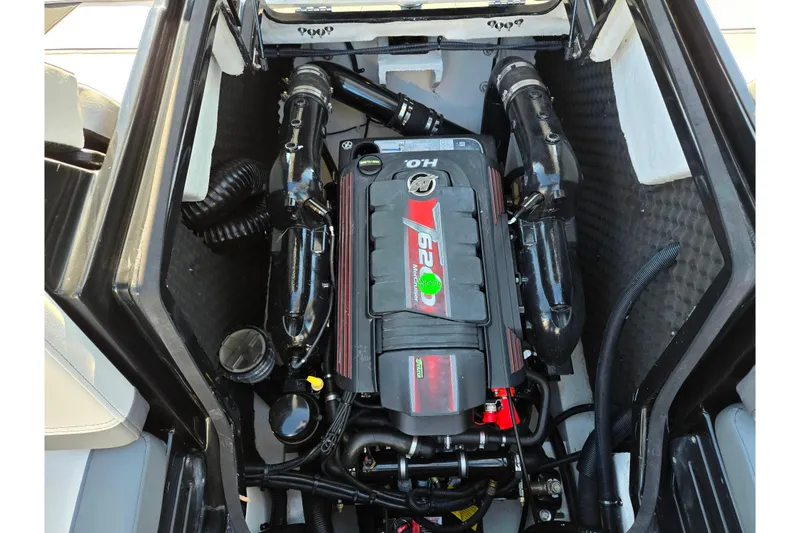 Slide: The Image of 2023 Heyday H22 boat engine compartment with powerful motor components. - 26