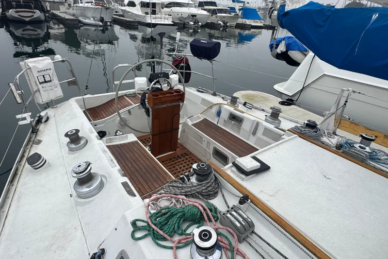 Slide: The Image of Cockpit view of 1985 Beneteau First 38 sailboat docked in marina. - 3