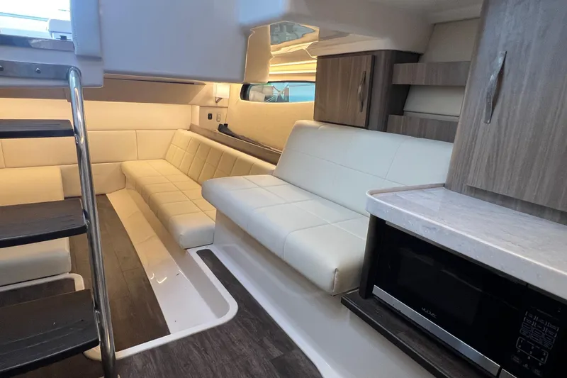 Slide: The Image of Luxurious interior of 2022 Regal 36 XO yacht with plush seating and modern design. - 48