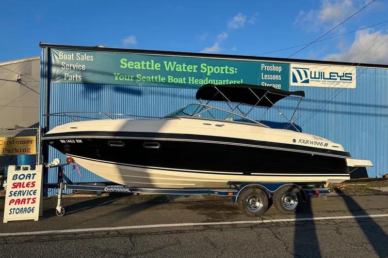 Slide: The Image of 2003 Four Winns 225 Sundowner boat at Seattle Water Sports dealership. - 3