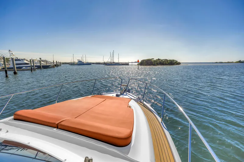 Slide: The Image of 2020 Sealine C390 yacht cruising on a sunny day with scenic ocean view. - 17