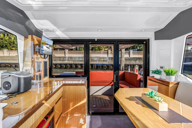 Slide: The Image of Luxurious interior of 2020 Sealine C390 yacht with modern furnishings and elegant design. - 29