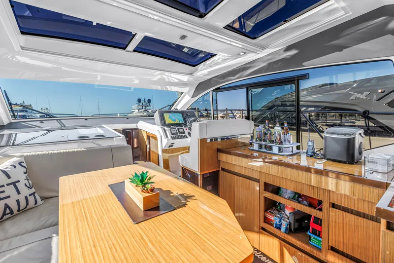 Slide: The Image of Luxurious interior of 2020 Sealine C390 yacht with modern amenities and panoramic windows. - 32