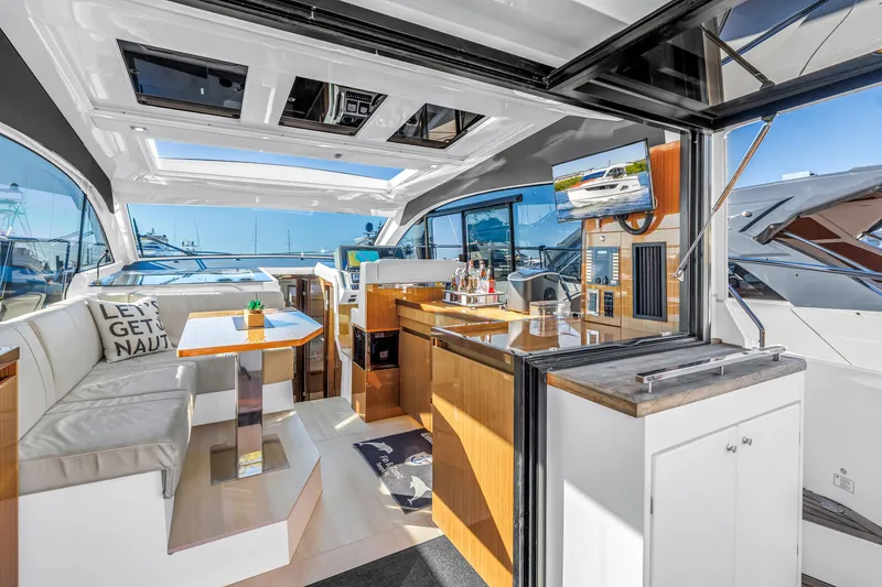 Slide: The Image of Luxurious interior of 2020 Sealine C390 yacht with modern amenities and open seating area. - 33