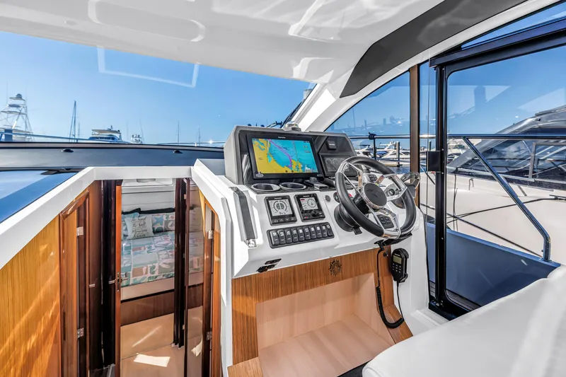 Slide: The Image of 2020 Sealine C390 yacht helm with navigation system and luxurious interior. - 40