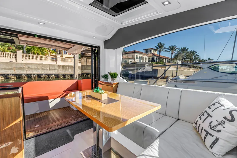 Slide: The Image of Luxurious interior of 2020 Sealine C390 yacht with elegant seating and waterfront view. - 41