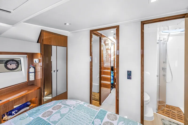 Slide: The Image of Luxurious interior of 2020 Sealine C390 yacht with modern bedroom and ensuite bathroom. - 45