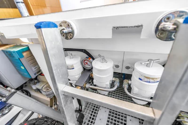 Slide: The Image of Engine compartment of 2020 Sealine C390 yacht with fuel filters and mechanical components. - 57