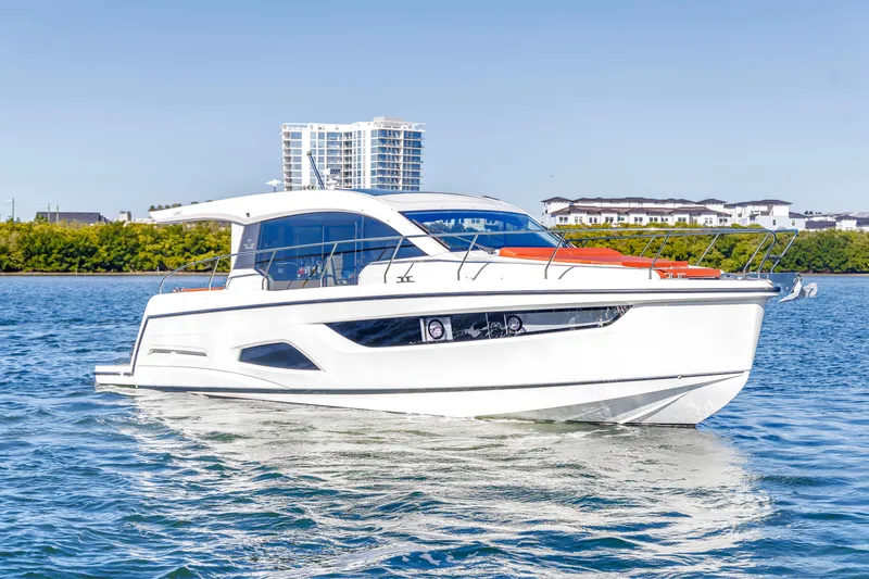 Slide: The Image of 2020 Sealine C390 yacht cruising on a sunny day, with modern design and sleek lines. - 6