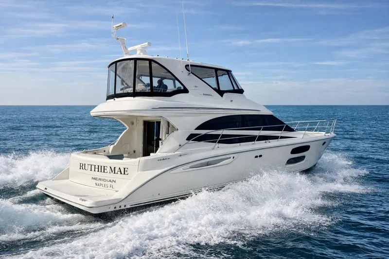 The Image of 2016 Meridian 441 Sedan yacht cruising on open sea. - 0