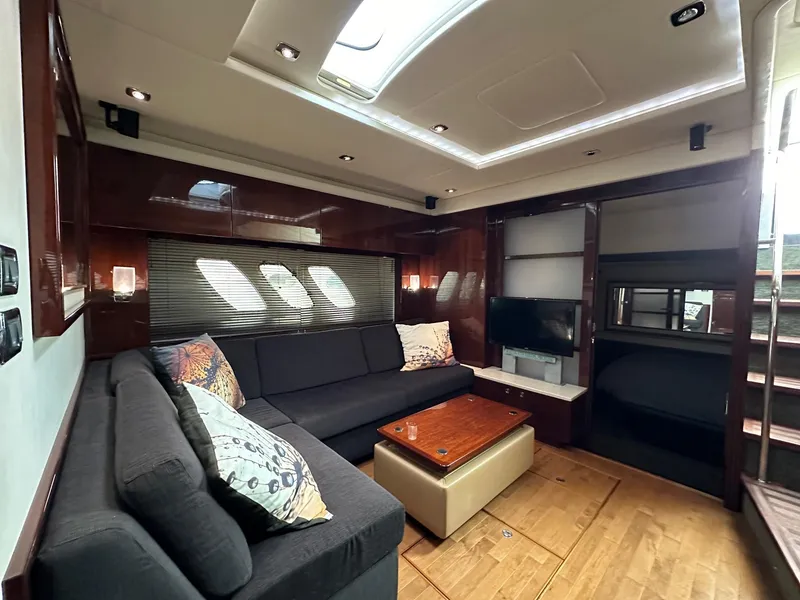Slide: The Image of Luxurious interior of 2010 Sea Ray Sundancer 540 yacht with modern furnishings. - 32